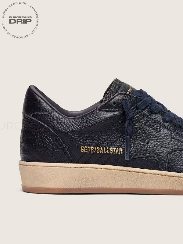 Star in navy-blue leather with tone-on-tone leather
